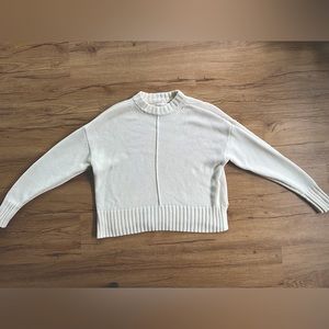A new Day cream knit sweater